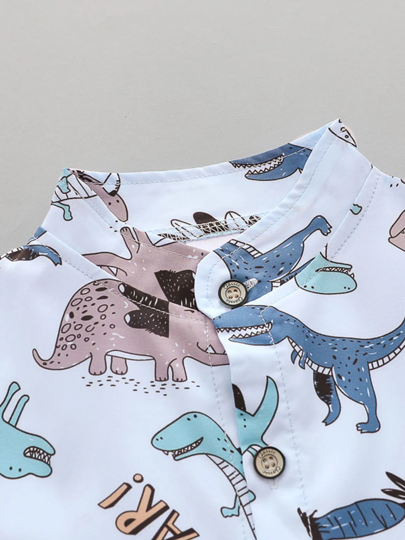 Bebê e criança completa impressão Top manga curta e Shorts conjunto, padrão de dinossauro manchado, camisa de gola alta, verão, 2pcs