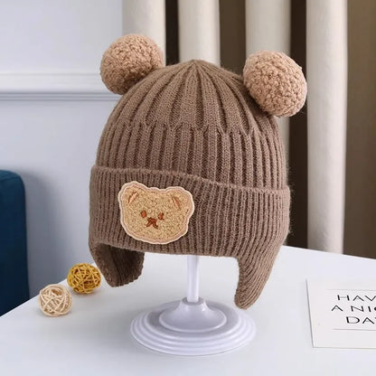 Chapéu de malha de lã de bebê com proteção auricular de urso chapéu infantil grosso quente versão coreana inverno